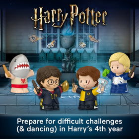 Little People Collector Fleur Delacour figure on Beauxbatons-inspired display.