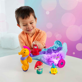 Little People Sebastian lights up the carriage with glowing sounds and music.
