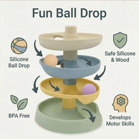 Little Rawr ball drop tower with wooden balls supporting fine motor development.