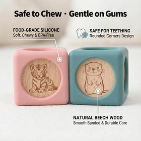 Little Rawr soft silicone exterior with wooden core shown in hand for gentle grip.