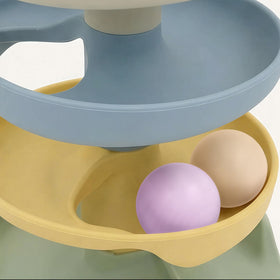 Little Rawr toddler playtime promotes hand-eye coordination and focus.