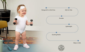 Little Spotters two-dumbbell rattles invite baby to explore grasp and shake