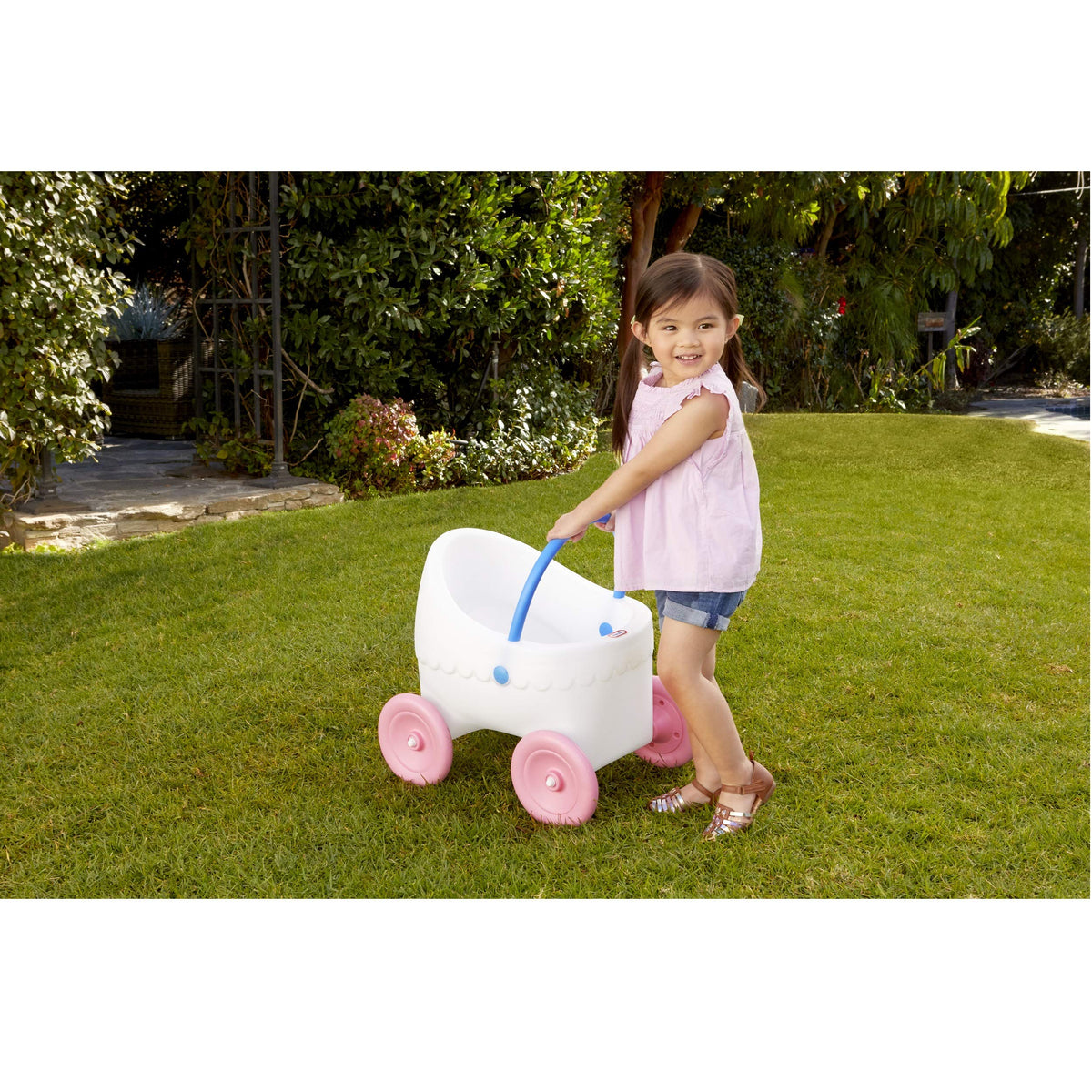 Little Tikes Classic Doll Stroller fits dolls up to 18 inches for versatile pretend play.