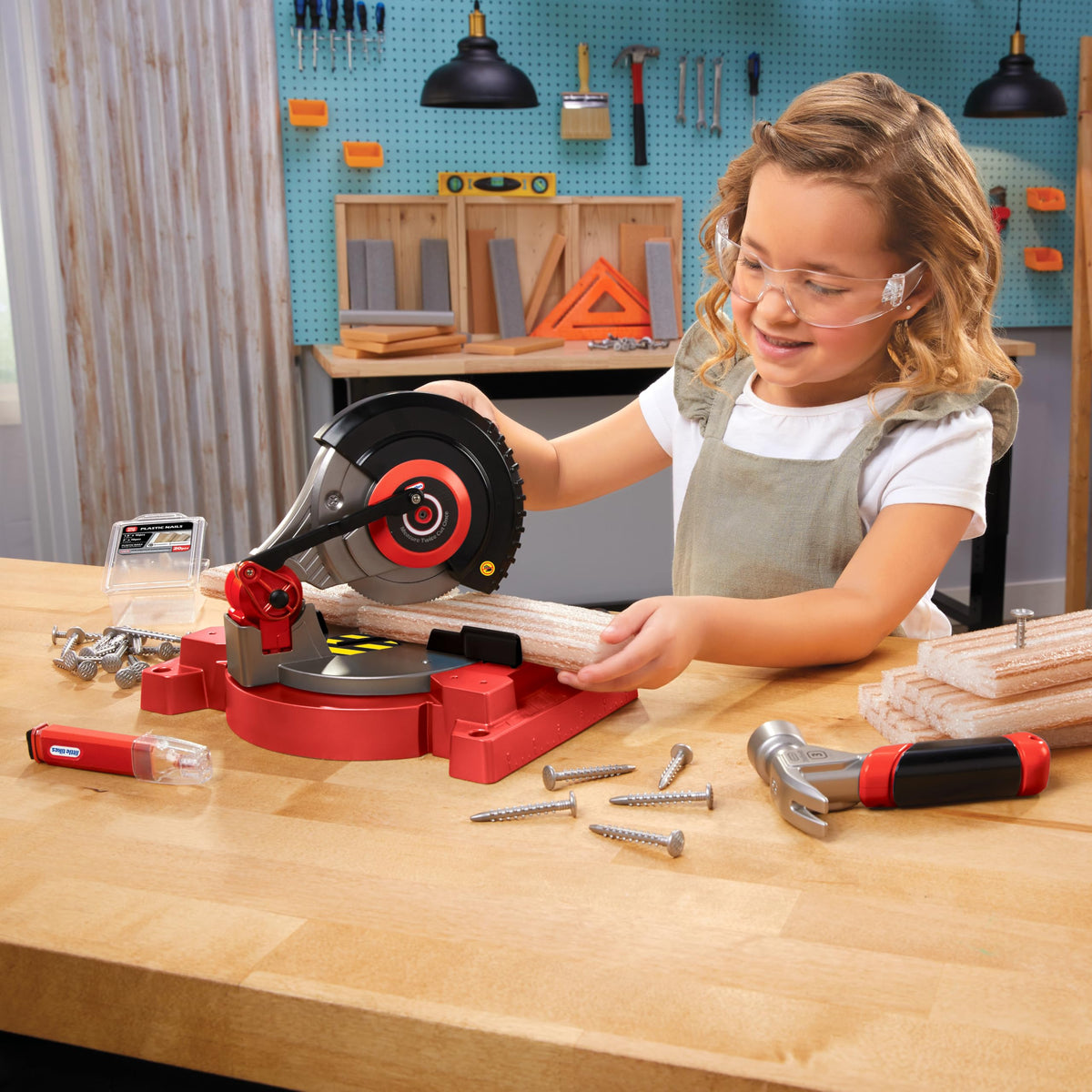 Little Tikes Power Saw with foam wood enables safe pretend construction at home.