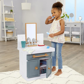 Little Tikes sink hair dryer provides pretend styling for imaginative play.