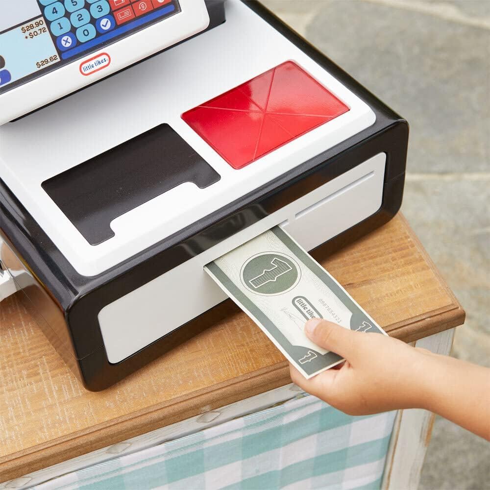 Little Tikes First Self-Checkout Stand lights and sounds showcasing immersive play.