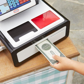 Little Tikes First Self-Checkout Stand lights and sounds showcasing immersive play.