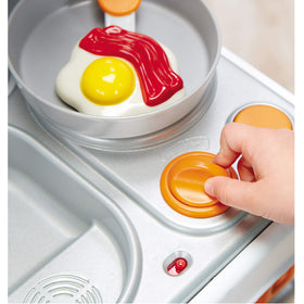 Little Tikes Home Grown Kitchen built-in storage keeps accessories organized