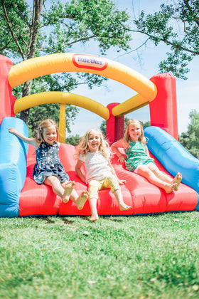 Little Tikes Jump 'n Slide Bouncer side view highlighting multi-child play
