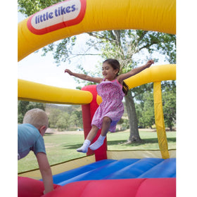 Little Tikes Jump 'n Slide Bouncer with stakes for secure outdoor anchoring