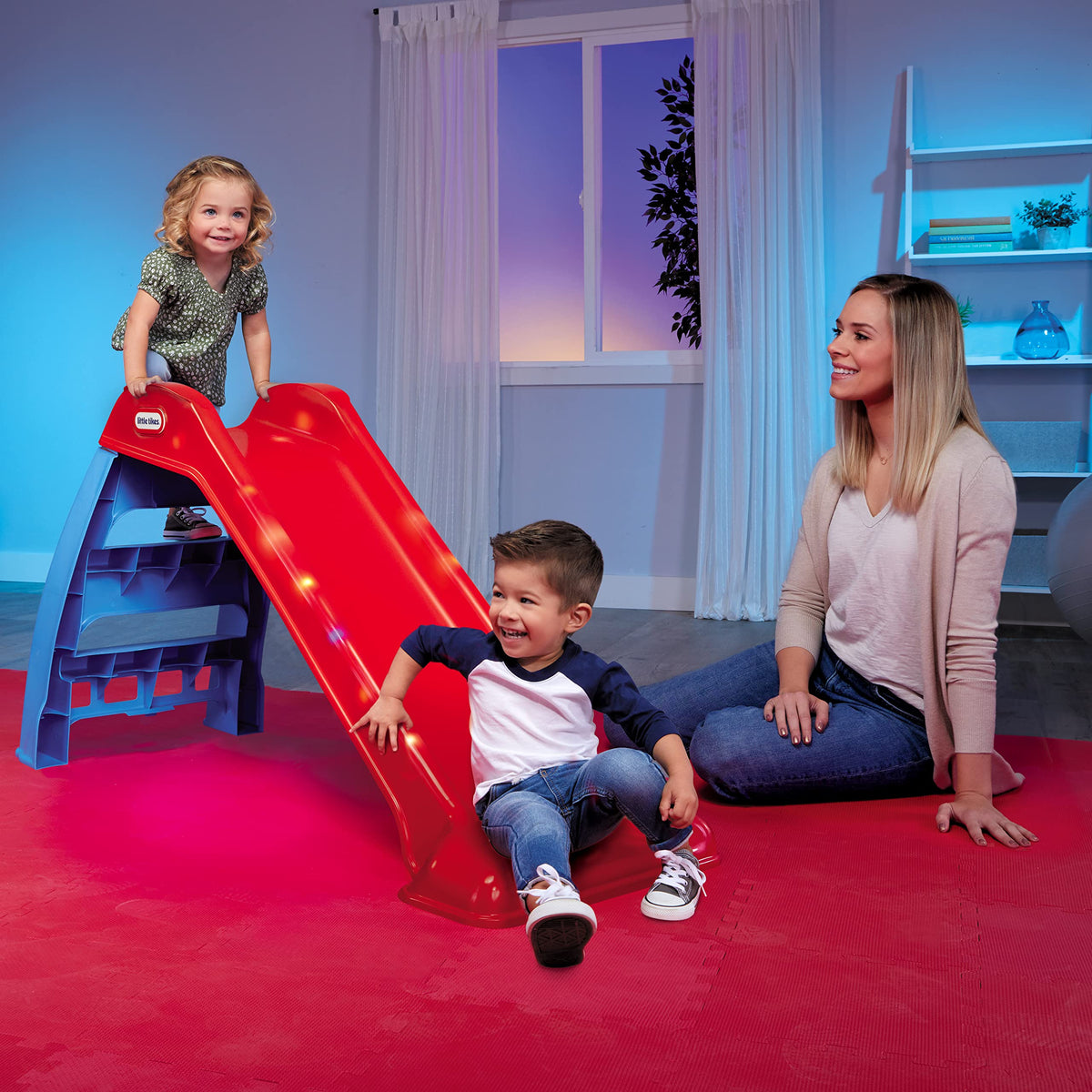 Little Tikes Light-Up First Slide showing eight LED patterns for engaging play.