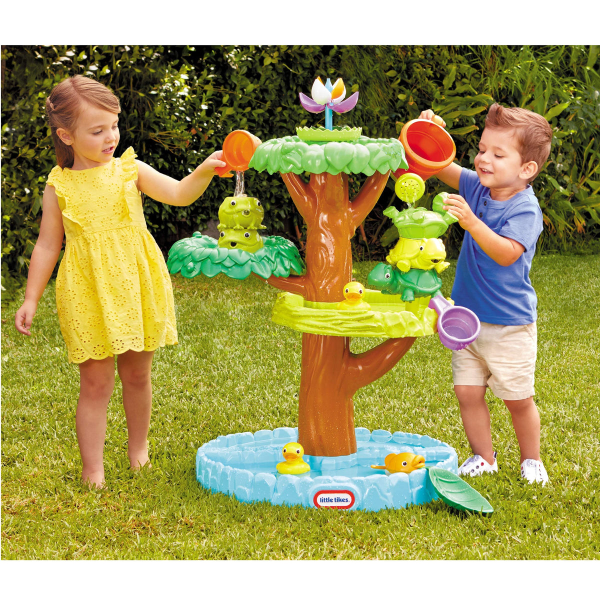 Little Tikes Magic Flower Water Table spinning turtles entertain kids during water play.
