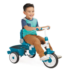 Foot platform on the Little Tikes trike protects tiny feet during stages