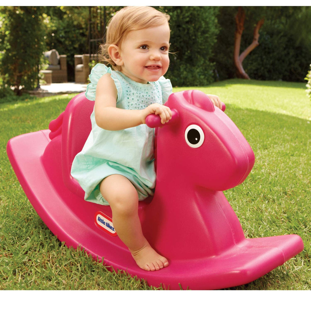 Little Tikes Rocking Horse Magenta Small side view showcases sturdy construction for active play