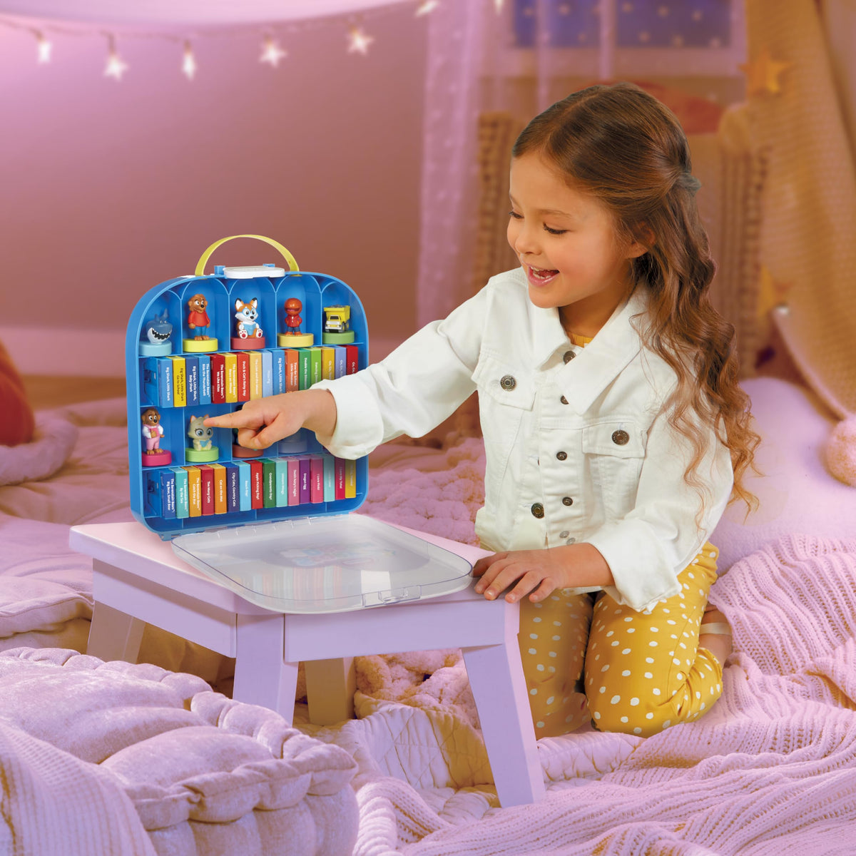 Little Tikes Story Dream Machine projects stories on walls for immersive reading.