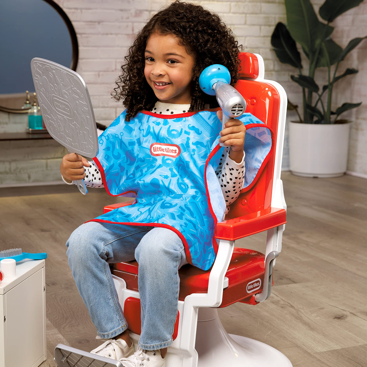 Little Tikes Style Station hair clip extensions for versatile pretend looks.