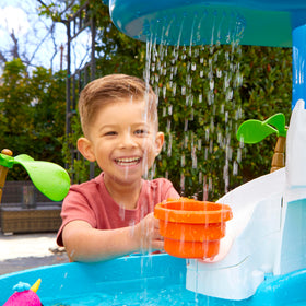 Little Tikes Waterfall Island Water Table narwhals invite storytelling and pretend sea adventures.