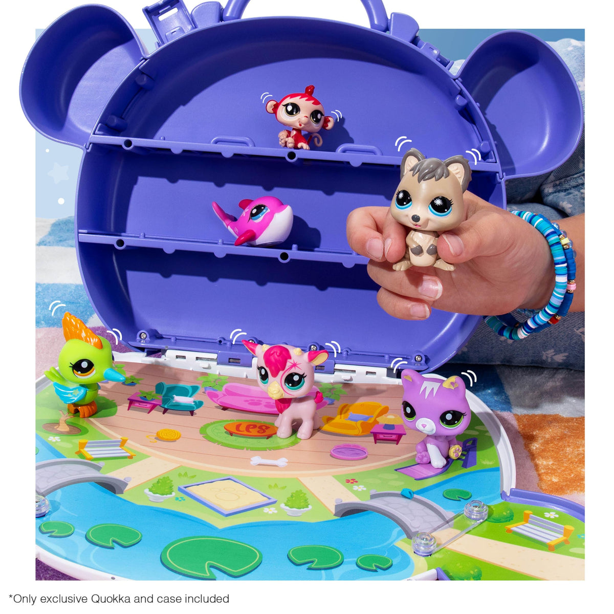Fold-out play scene inside the Littlest Pet Shop case for imaginative play.