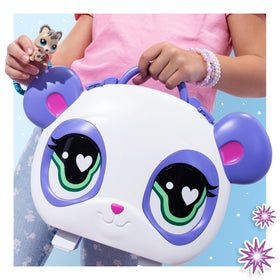 Open Littlest Pet Shop carry case showing tiered display shelves.