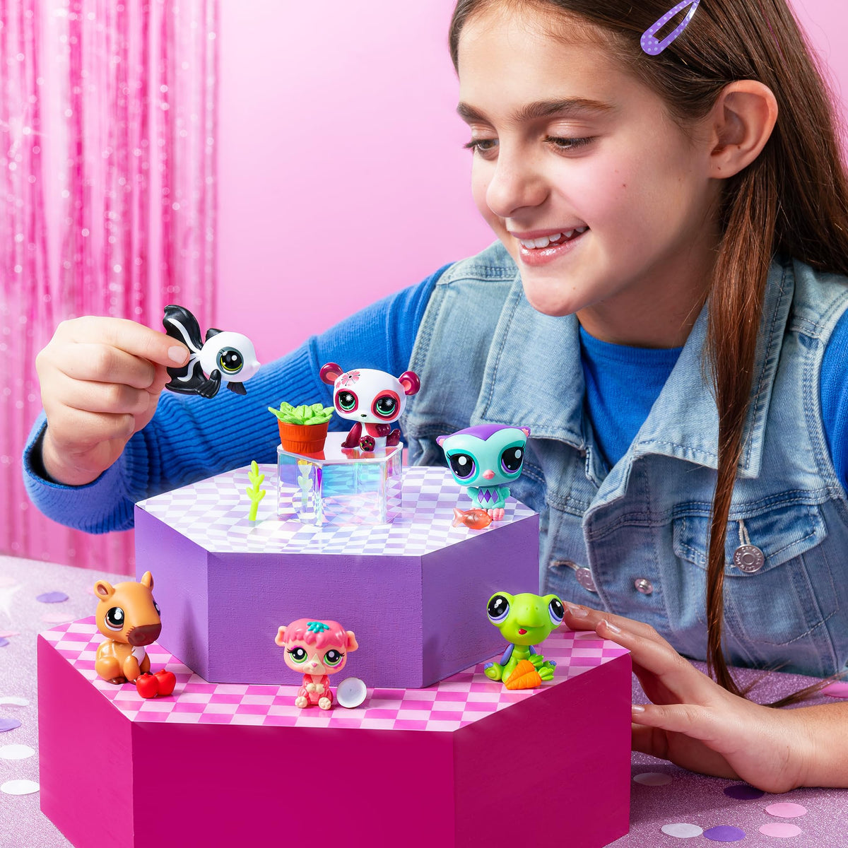 Littlest Pet Shop digital coin surprises unlock virtual rewards and extras.