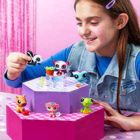 Littlest Pet Shop digital coin surprises unlock virtual rewards and extras.
