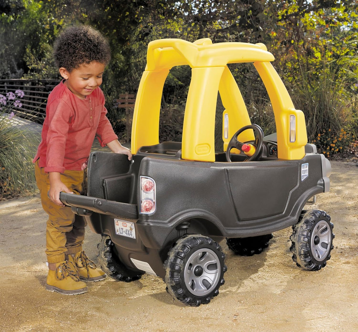 Little Tikes Cozy Truck Ride-On Black supports ages 18 months to 5 years with 50 lb limit