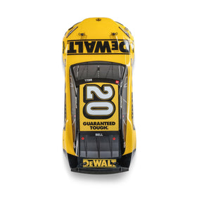 Losi RC car brushed motor in action on yellow surface