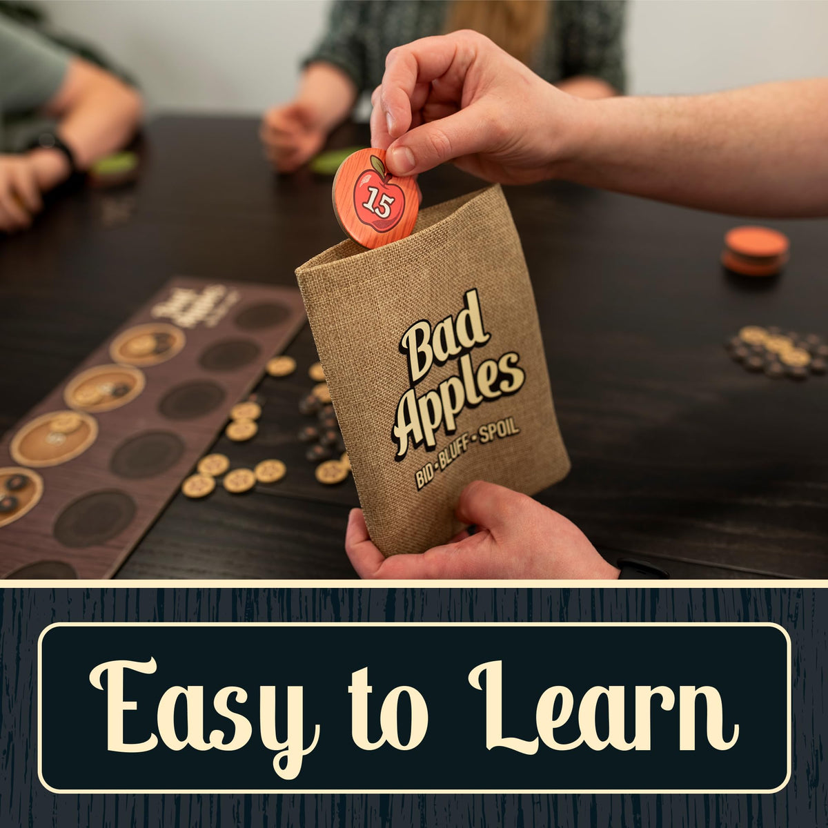 Lost Boy Entertainment Bad Apples players around the burlap sack during a tense moment.