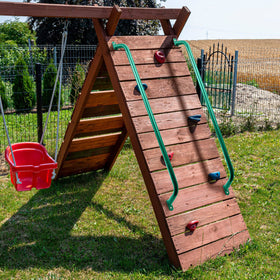 Lounsweer long grab bar enhances balance when entering a playhouse.