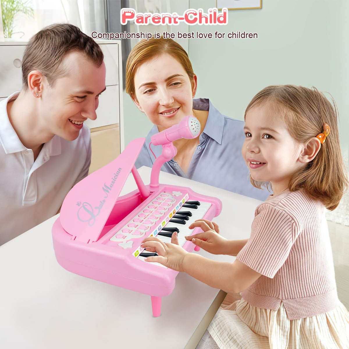 Love&Mini pink piano microphone attachment enables interactive sing-alongs.