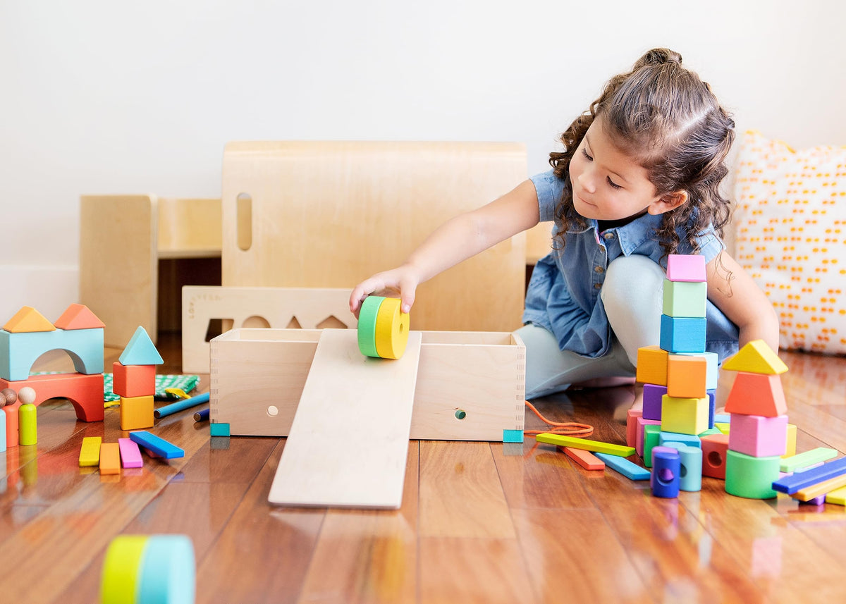 Lovevery The Block Set pull car transformation invites planning and sequence-based play.