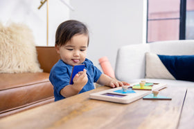 Lovevery Friends of All Shapes Puzzle: wooden pieces with water-based finishes promote safe play.