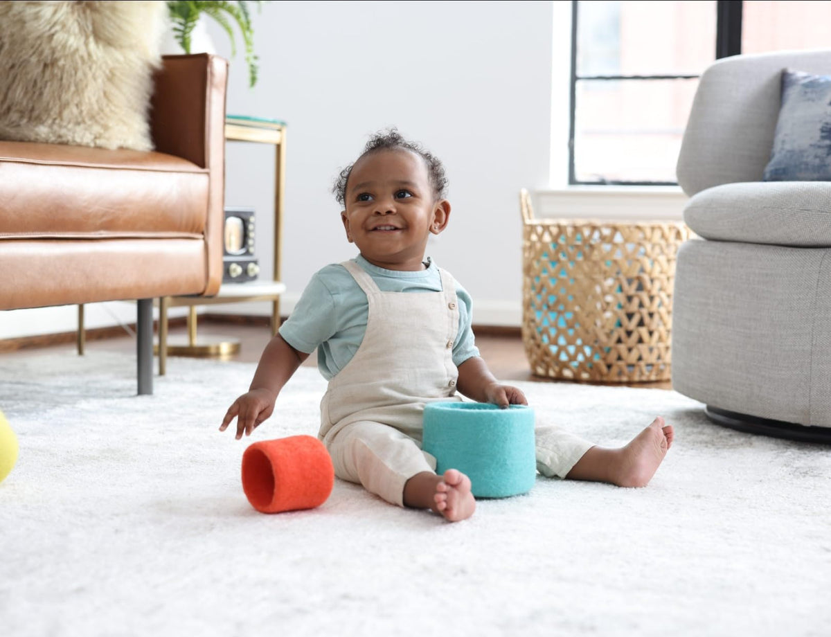 Lovevery Nesting Felt Baskets crafted from natural materials for real object play.