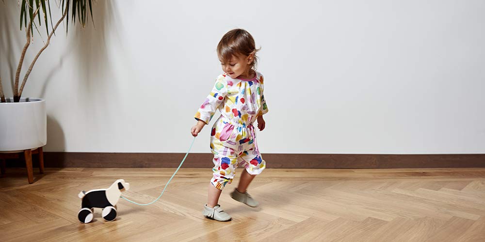 Lovevery The Pull Pup ears and tail up add expressive pretend play moments