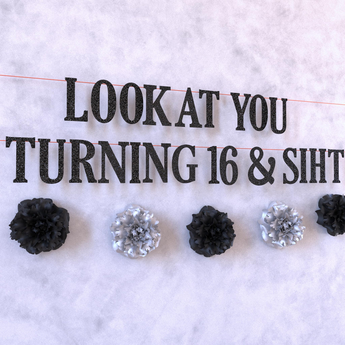 LQA Decor cake topper highlights the milestone with a playful touch.