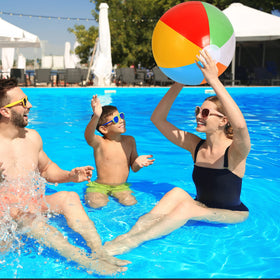 LYDTICK pool party scene with rainbow beach balls for water games.