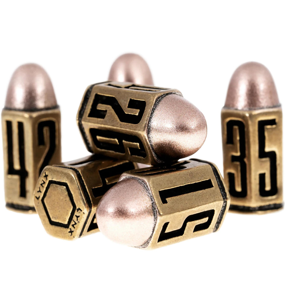 LYNX Bullet Metal Dice Set in brass, close-up for premium rolling feel.