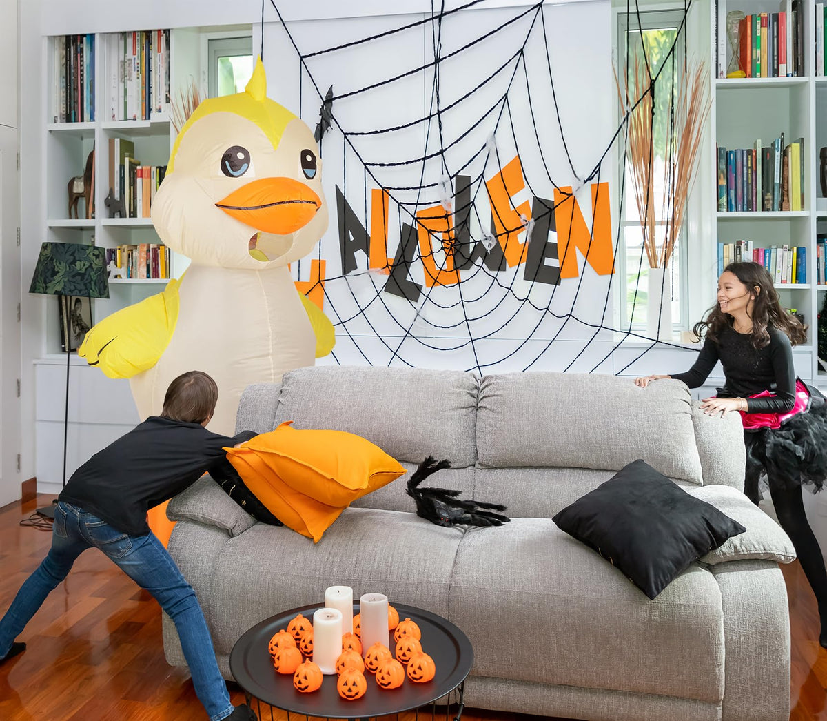 M MH ZONE inflatable duck costume worn by a child during play