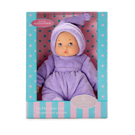 Madame Alexander my first lavender baby doll face closeup highlights blue eyes for storytelling.