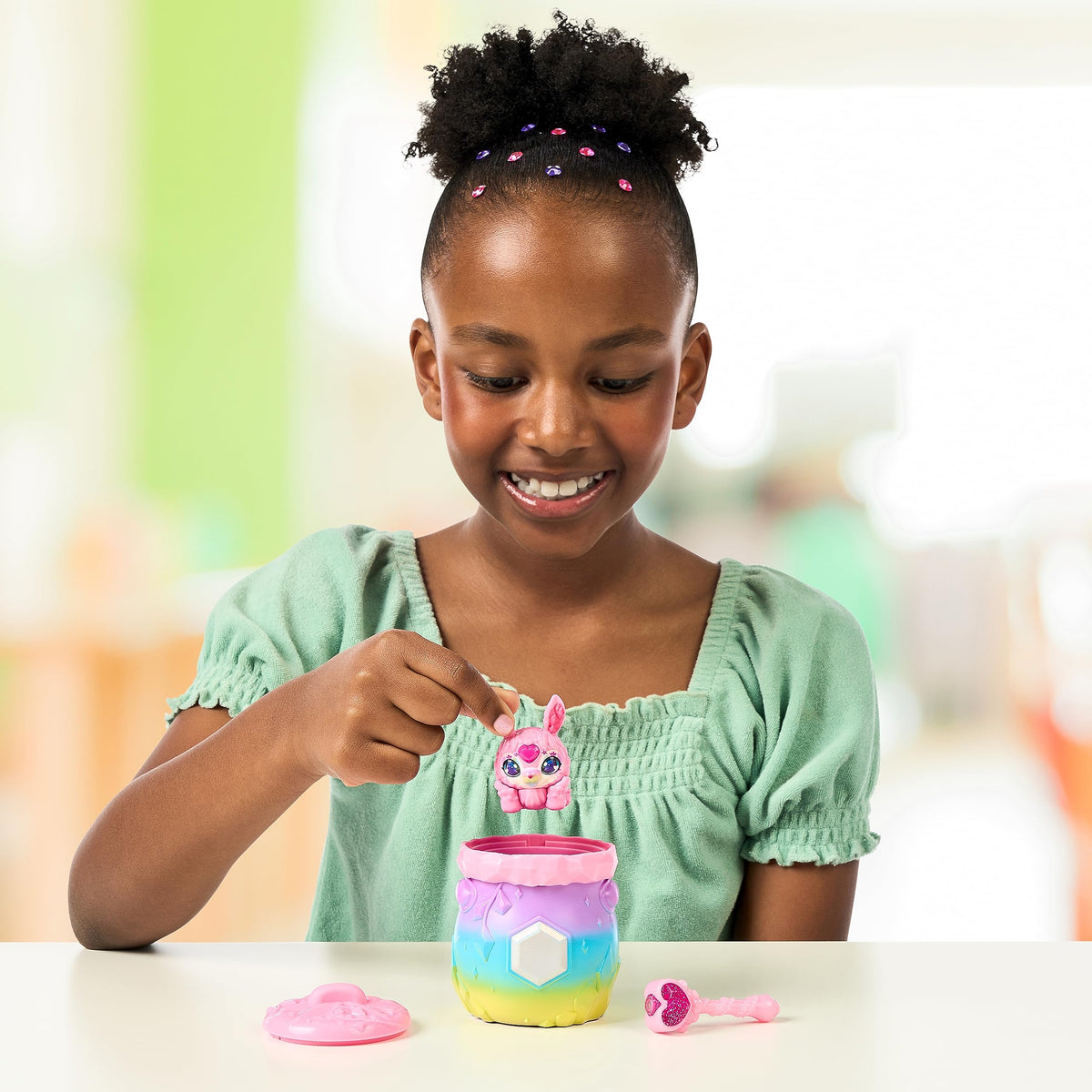 Magic Mixies Raina-Bobo the Glowling emits a soft glow for cozy playtime.