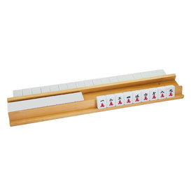 Tabletop mahjong setup featuring Magic Sewing Machine wooden racks on a clean surface.