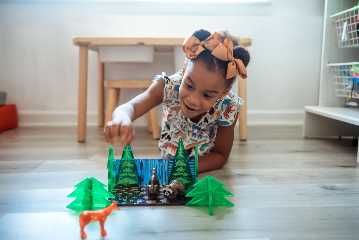 MAGNA-TILES Deer figurine sparks storytelling in forest scenes.