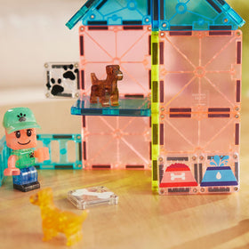 MAGNA-TILES mix-and-match doggy caretaker figure enhances role-play.