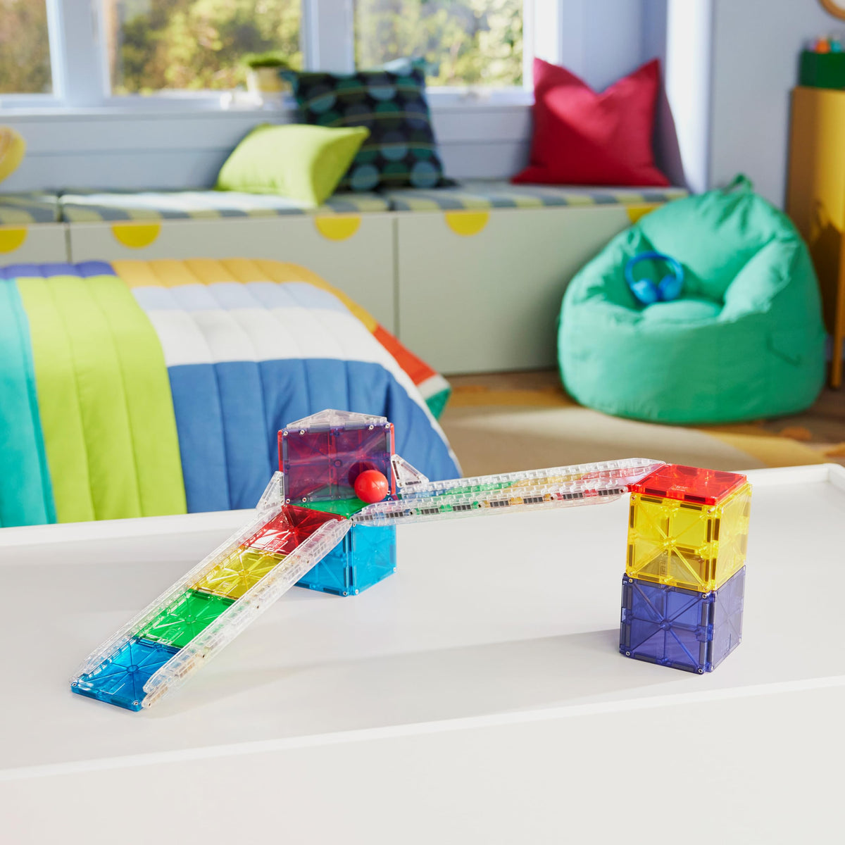 Angled ramps for Magna-Tiles Rail Racers showcase gravity-powered launch options.