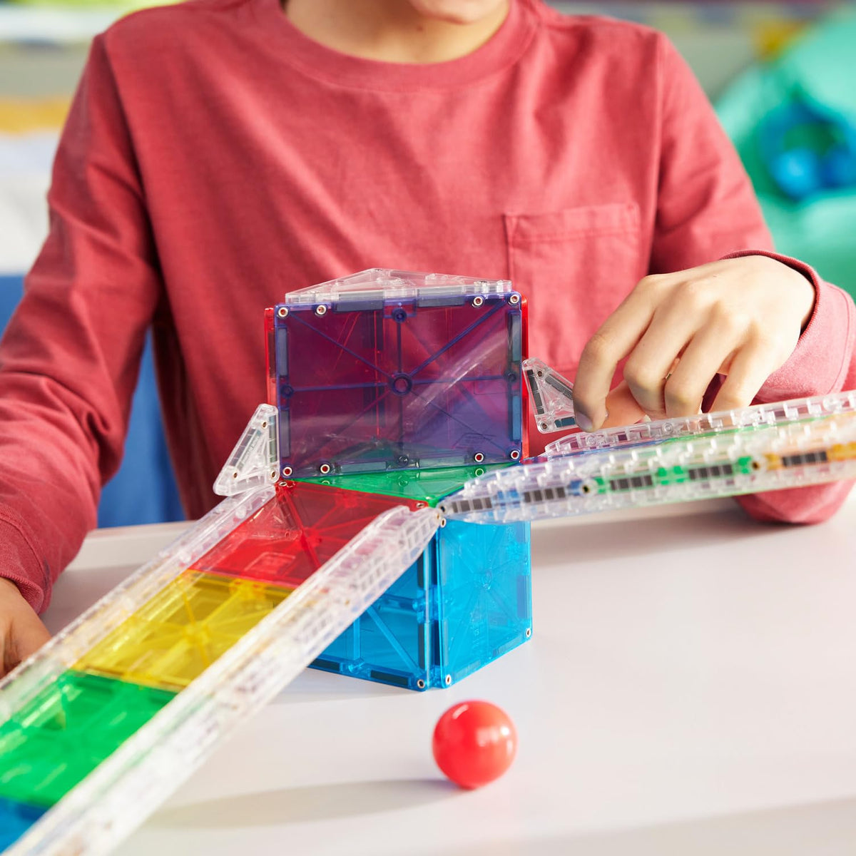 MAGNA-TILES Rail Racers bridges support imaginative construction and storytelling.