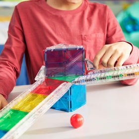 MAGNA-TILES Rail Racers bridges support imaginative construction and storytelling.