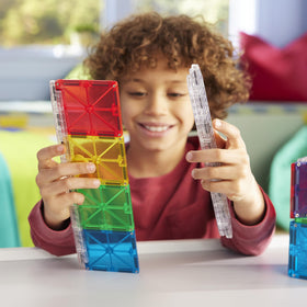 Extension rails for Magna-Tiles Rail Racers enable longer, more intricate layouts.