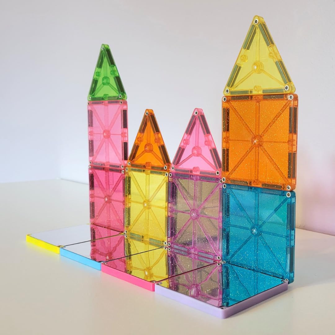 MAGNA-TILES Stardust glitter triangles add dimensional sparkle to creations.