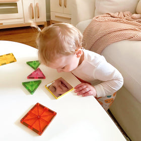 MAGNA-TILES Stardust mirrored squares reflect light for striking designs.
