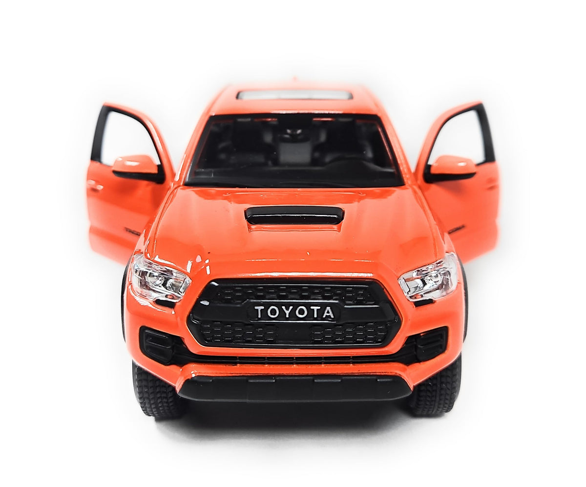 Maisto Tacoma TRD Pro 1:27 hood-open shows mechanical realism in miniature